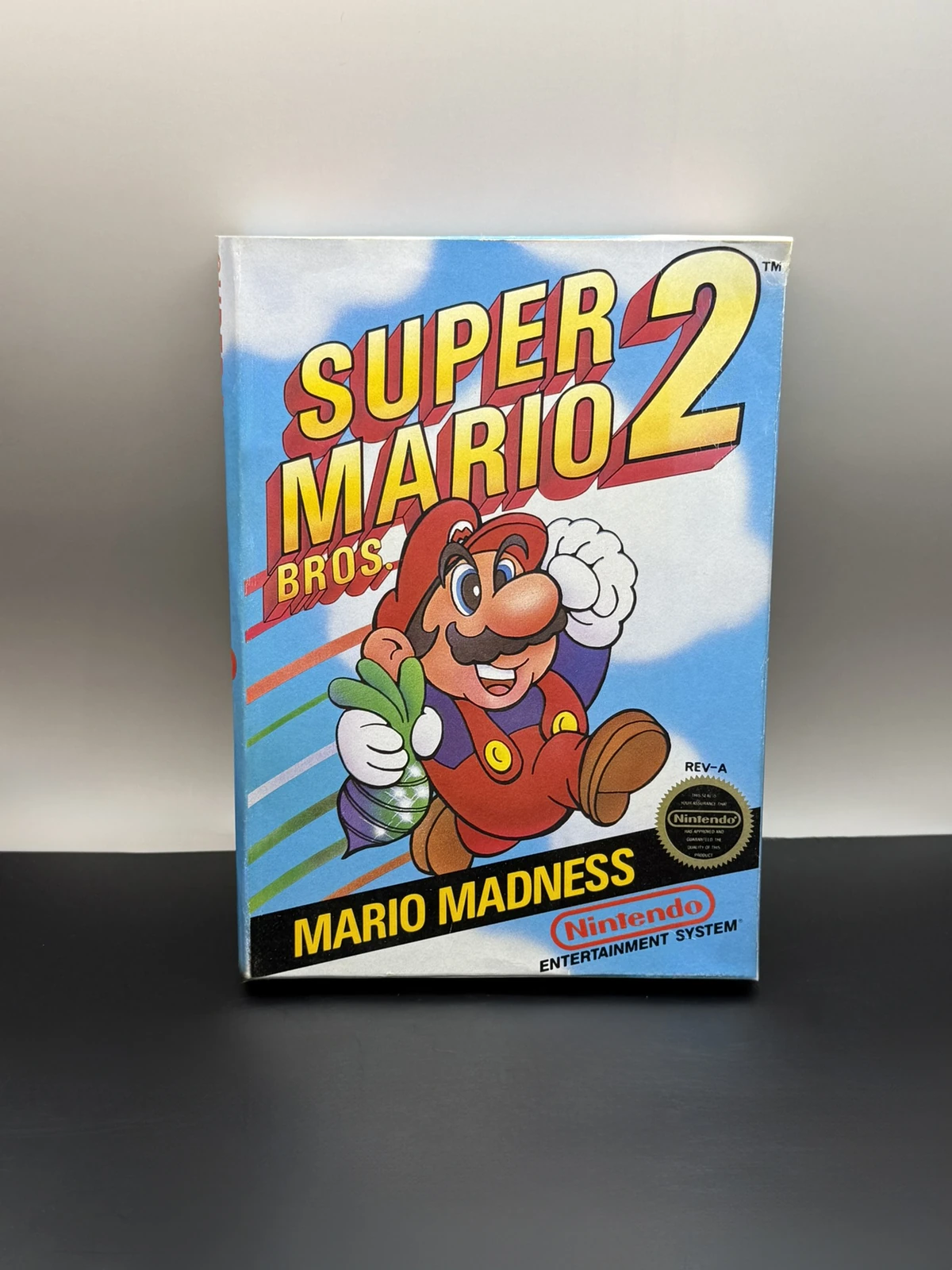 Front of the Super Mario Bros. 2 NES box, with REV-A marking and round Nintendo seal